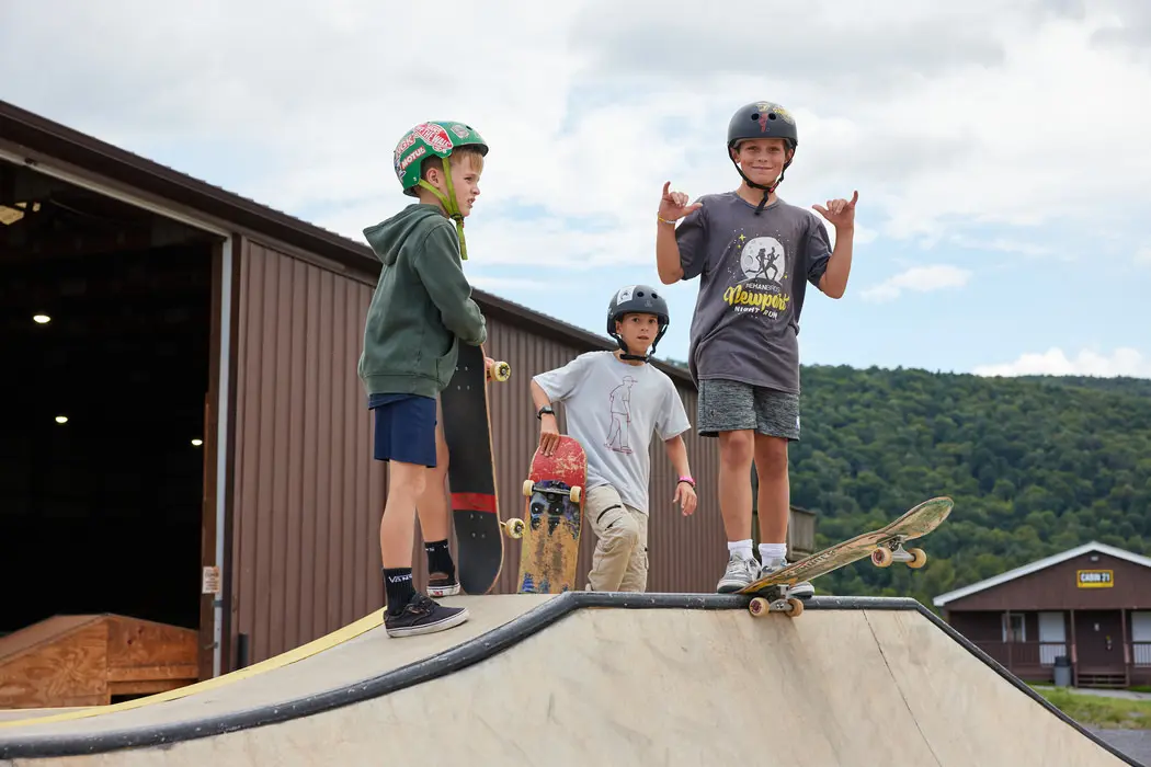 skateboard campers about to drop in the park