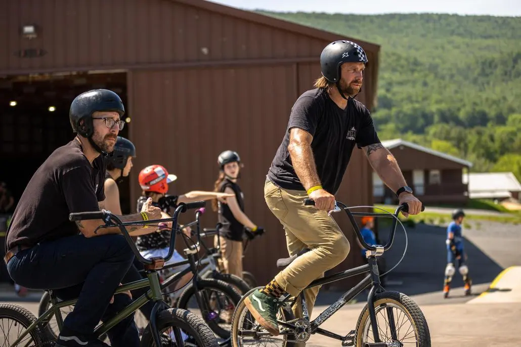 Family campers on bikes
