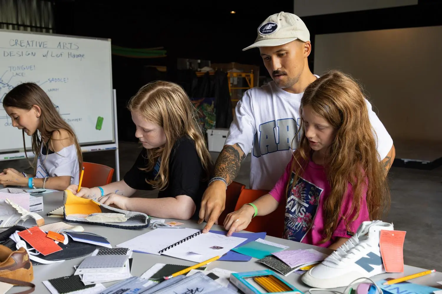 Campers designing shoes